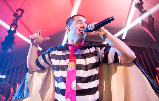 Nick Jonas performs as the ‘Hamburgular’ during the 2015 Maxim Halloween Party at the Beverly Hills Estate, Beverly Hills, CA on October 24, 2015. Stoli, THE Vodka, served as the official liquor of the 2015 Maxim Halloween Party.(Photo by Colin Young-Wolff/Invision for Stoli/AP Images)