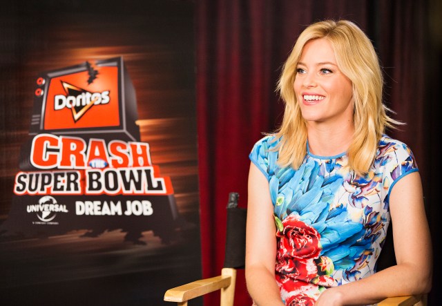 Actress Elizabeth Banks helps the Doritos brand kick-off the ninth installment of the Crash the Super Bowl contest, on Wed., Sept. 3, 2014 in Los Angeles. Fans from participating countries around the world are invited to enter their homemade 30-second Doritos ads as part of this year’s competition for the chance to see those ads air during the Super Bowl broadcast. One lucky fan – based on consumer votes - will win the grand prize: a “dream” job working onsite at Universal Pictures in Hollywood and $1 million. See full rules and enter at Doritos.com between September 12 and November 9. (Photo by Colin Young-Wolff/Invision for Doritos/AP Images)