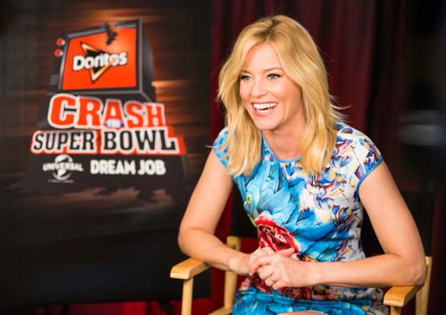 Actress Elizabeth Banks helps the Doritos brand kick-off the ninth installment of the Crash the Super Bowl contest, on Wed., Sept. 3, 2014 in Los Angeles. Fans from participating countries around the world are invited to enter their homemade 30-second Doritos ads as part of this year’s competition for the chance to see those ads air during the Super Bowl broadcast. One lucky fan – based on consumer votes - will win the grand prize: a “dream” job working onsite at Universal Pictures in Hollywood and $1 million. See full rules and enter at Doritos.com between September 12 and November 9. (Photo by Colin Young-Wolff/Invision for Doritos/AP Images)