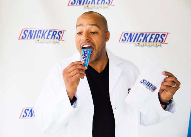 Fans were greeted by actor Donald Faison at The Grove in Los Angeles on Tuesday, February 23, 2016, as he diagnosed their social hunger symptoms and sampled the new SNICKERS® Crisper - filled with crisped rice, peanuts and caramel covered in milk chocolate. Colin Young-Wolff/AP Images for SNICKERS Brand.
